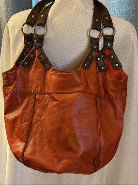 The Sak Leather Shoulder Bag in Burnt Orange with Dark Brown Straps